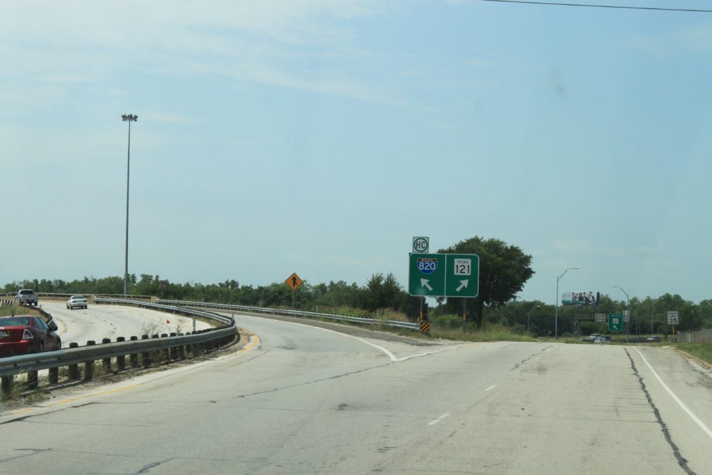 I-820 southbound frontage road south of Hurst Blvd showing the diverge point for I-820 southbound or SH 121 southbound