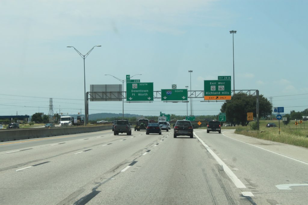 I-820 southbound approaching Hurst Blvd and split with SH 121.