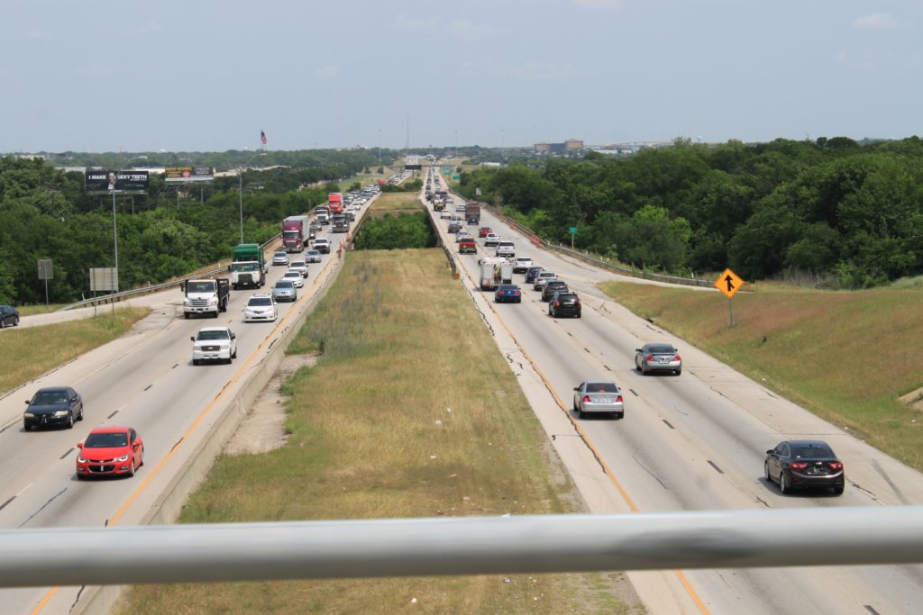 I-820 looking north from Randol Mill Rd. Trinity River bridges are in mid-ground.