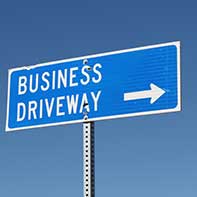 Blue Highway Sign: Business Driveway