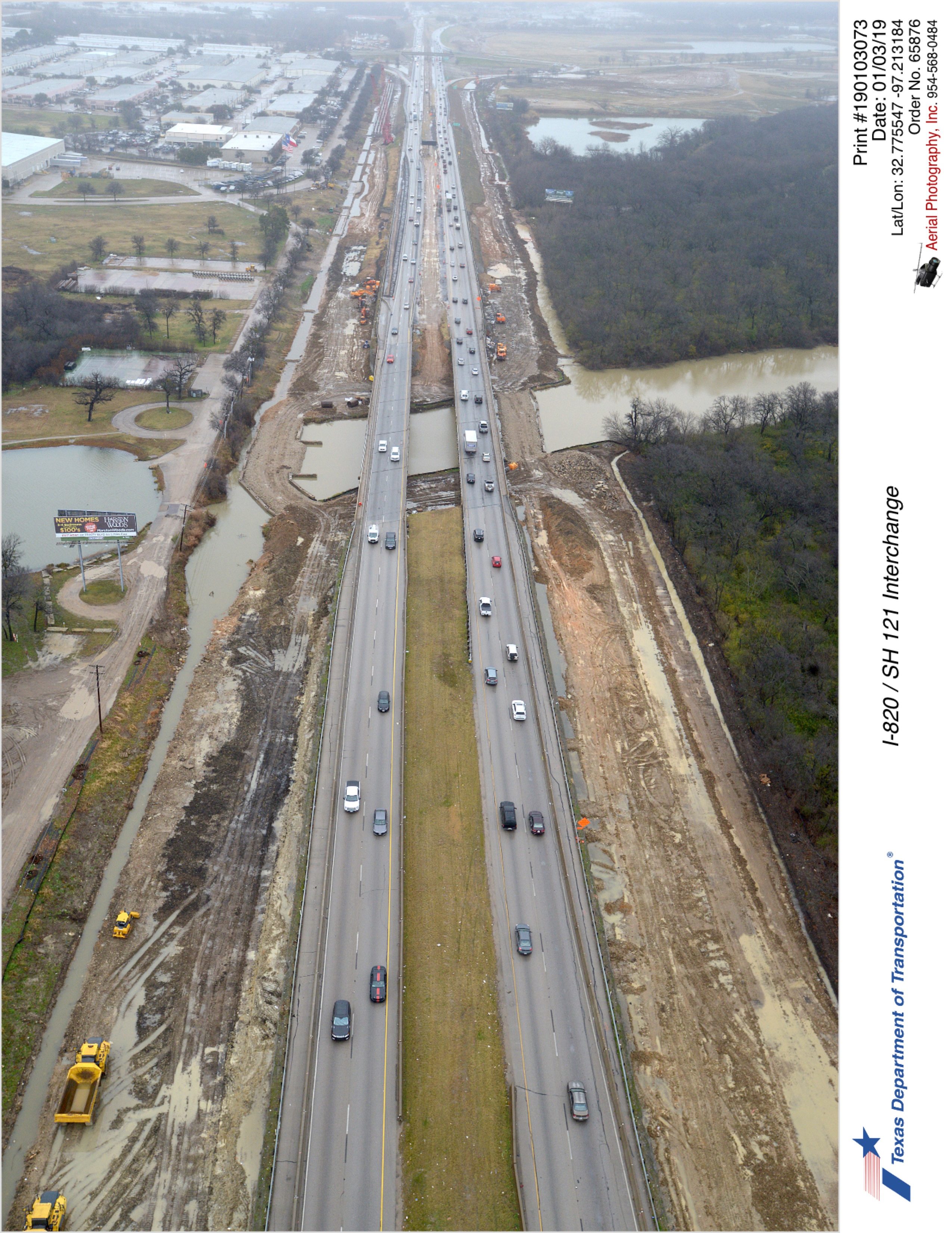 I-820 looking north over the Trinity River. Construction between right-of-way and mainlanes.