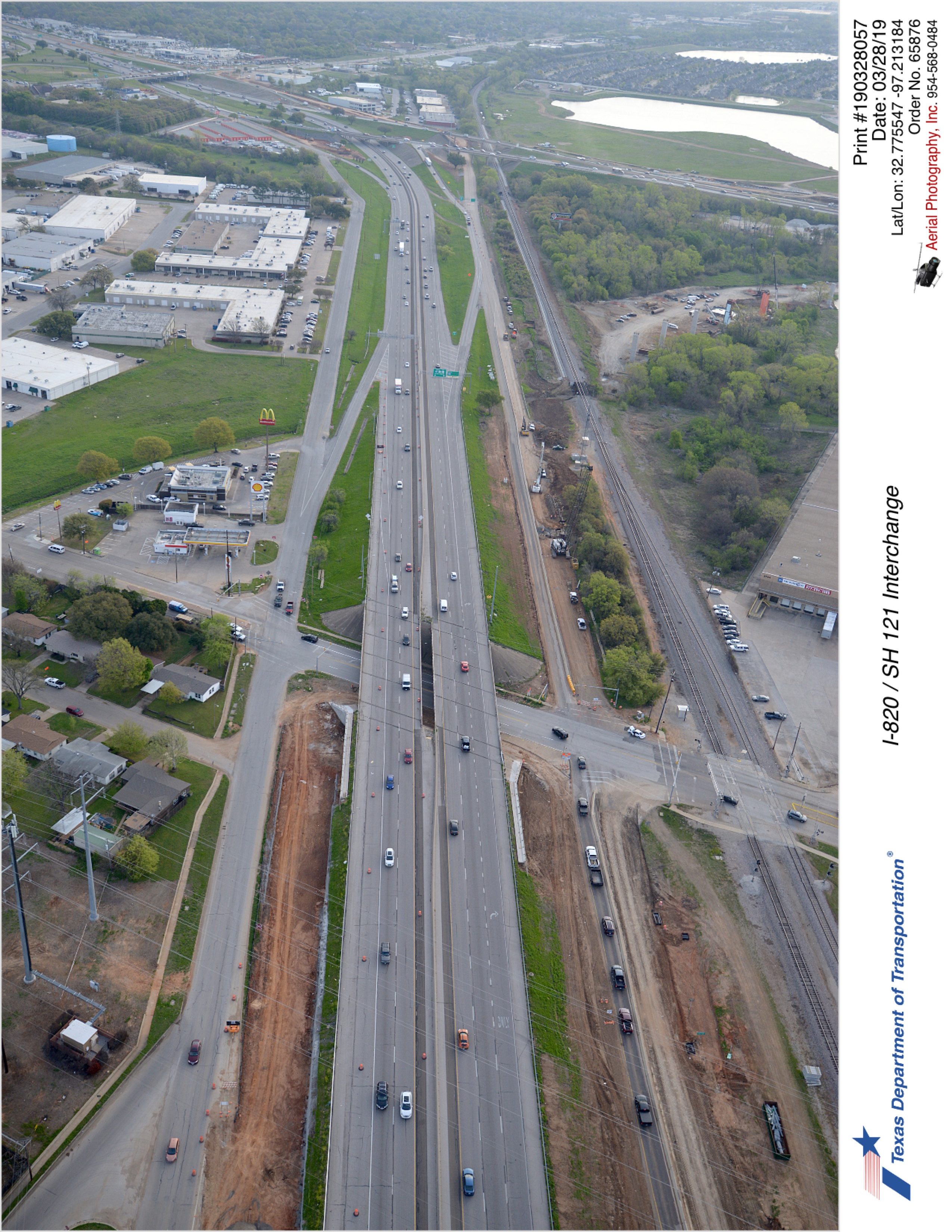 SH 121 looking northeast with Handley-Ederville Road in foreground and I-820 in background.