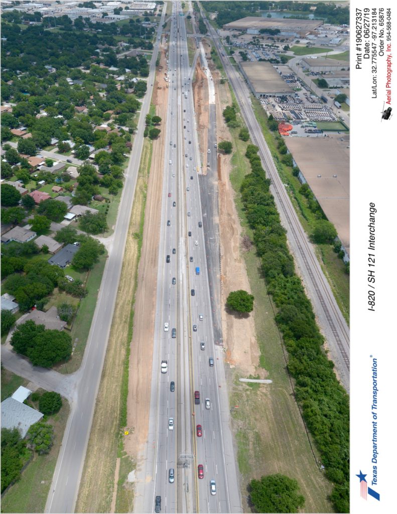 SH 121 looking northeast over Big Fossil Creek. Construction of new Handley-Ederville Rd exit ramp and frontage road seen.
