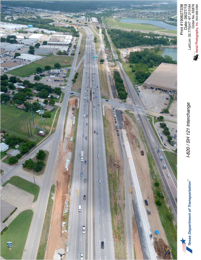 SH 121 looking northeast at Handley-Ederville Rd interchange. Construction of new northbound frontage road seen south of SH 121.