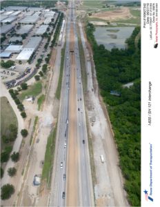 I-820 looking north over Trinity River. Construction seen on inside and outside of I-820 for new mainlanes.
