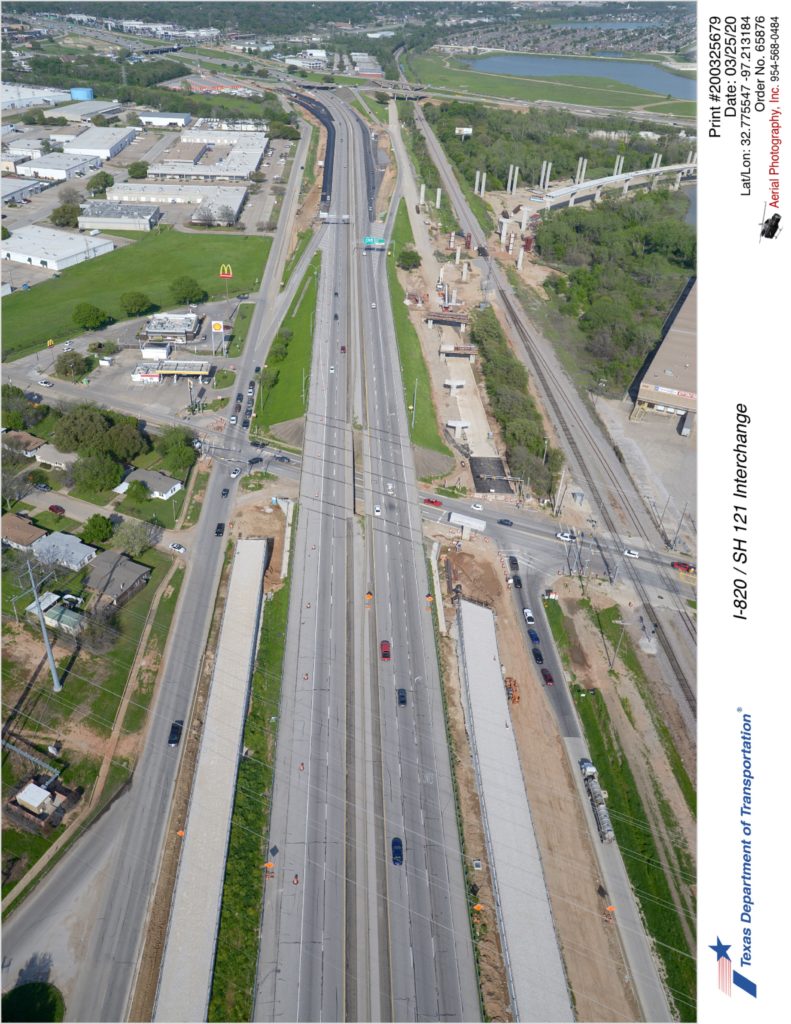 SH 121 looking northeast over Handley-Ederville Rd. Construction of northbound SH 121 to southbound I-820 direct connector ramp shown on south side of road.