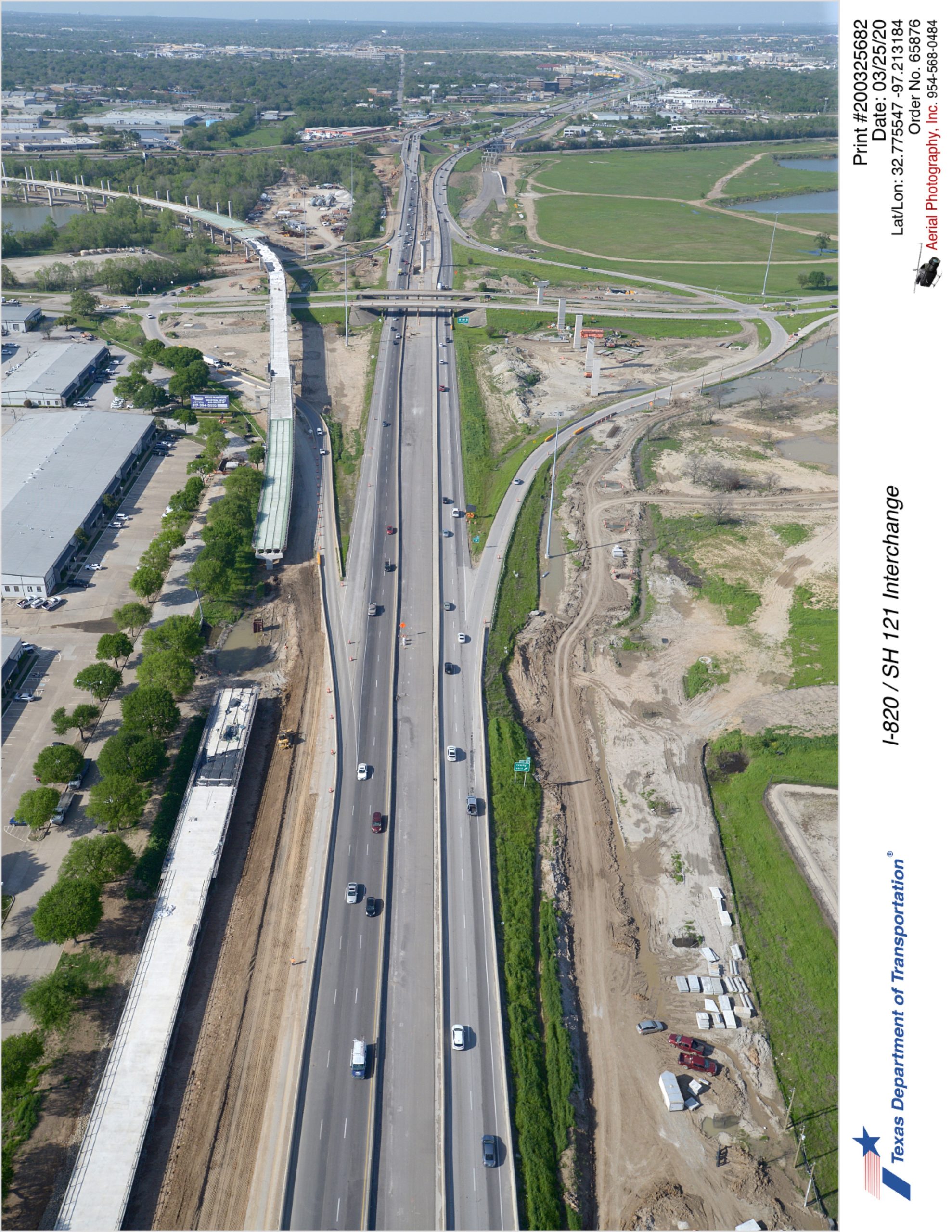 I-820 looking north with Trinity Blvd interchange in background. Construction of SH 121 direct connector ramp and new southbound mainlanes shown on west side.