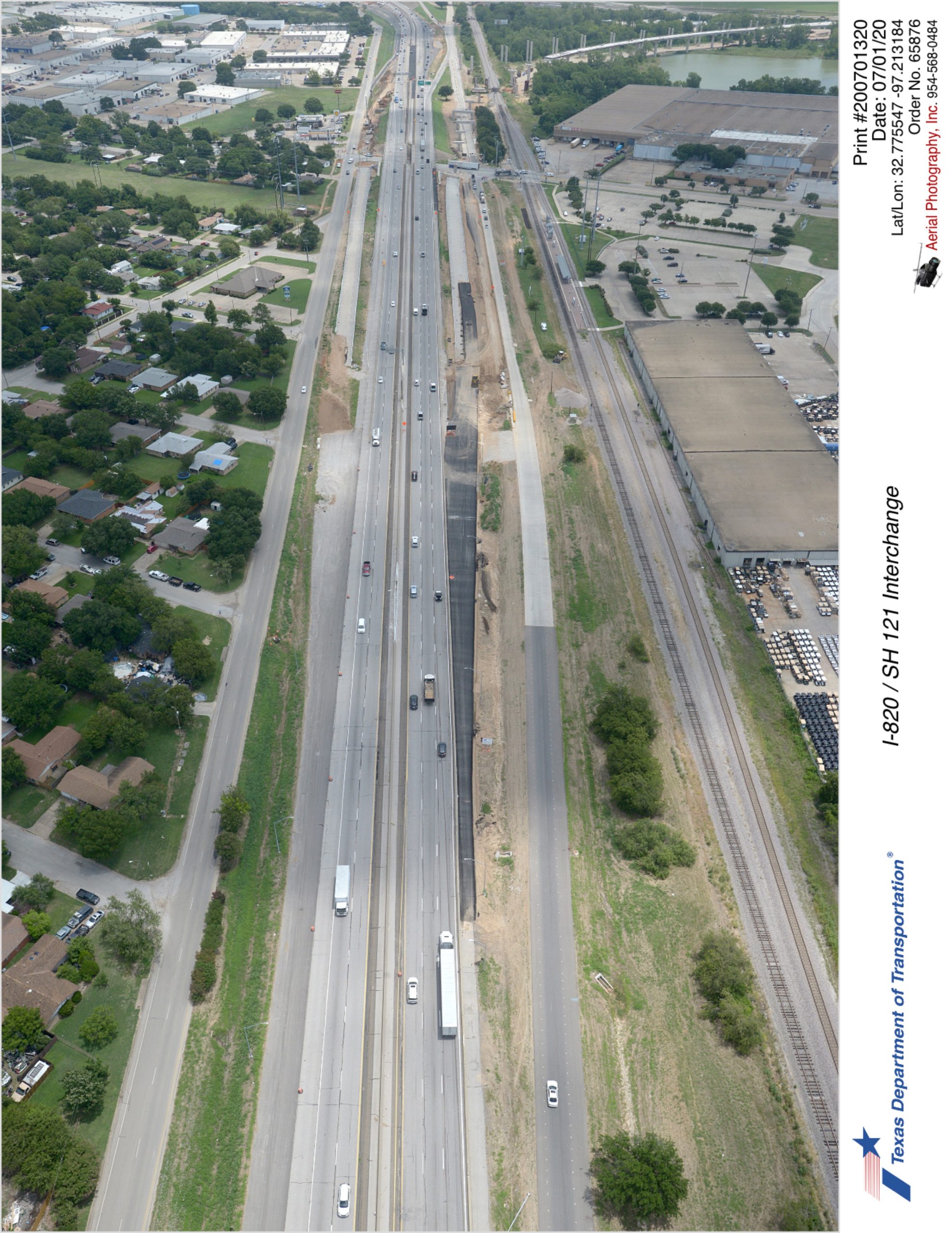 Looking northeast over SH 121 with Handley-Ederville Rd interchange in background. Construction of direct connector approaches and new northbound exit to Handley-Ederville Rd shown.