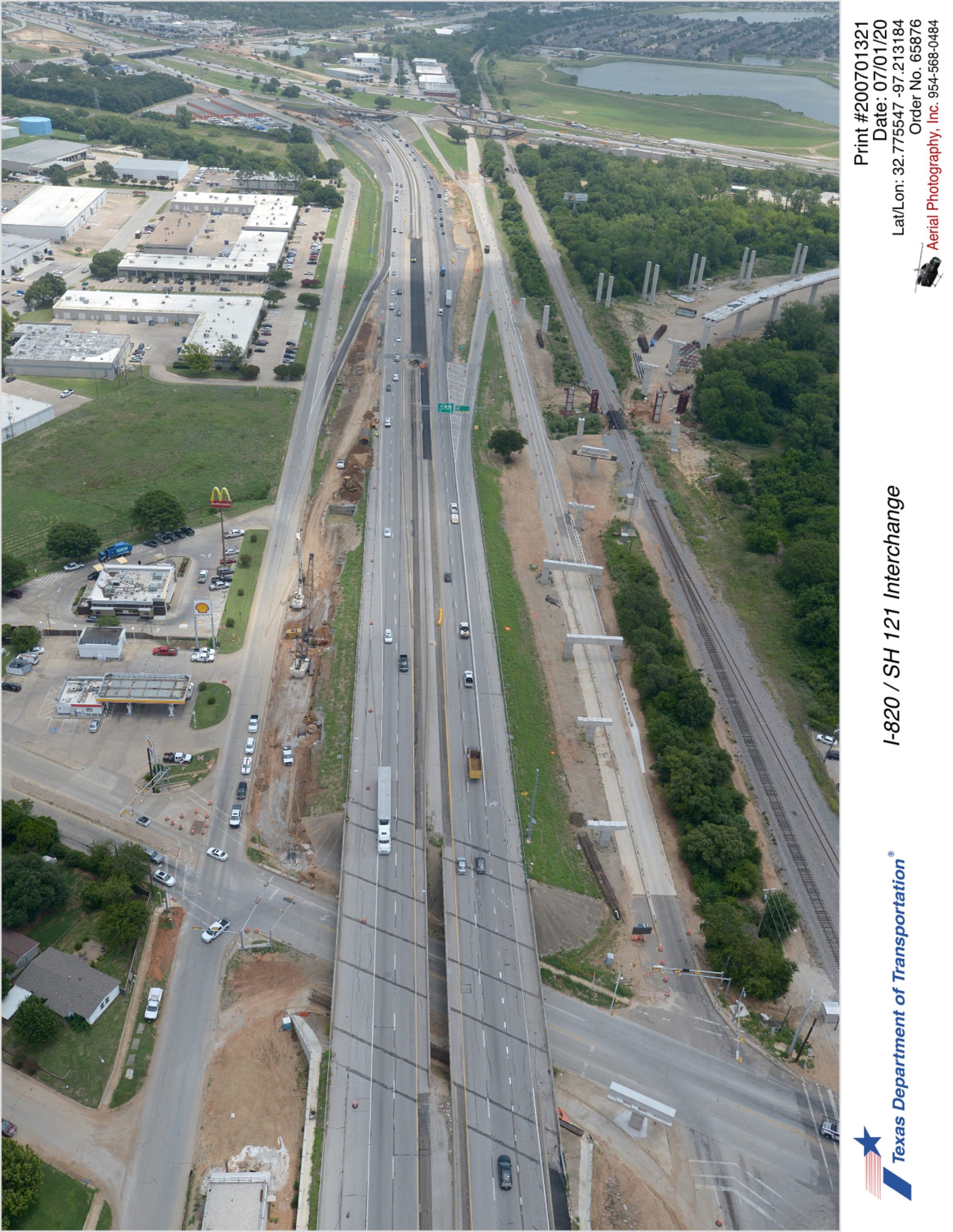 Looking northeast over SH 121/Handley-Ederville Rd interchange. Construction of new direct connector bridge to I-820 shown.