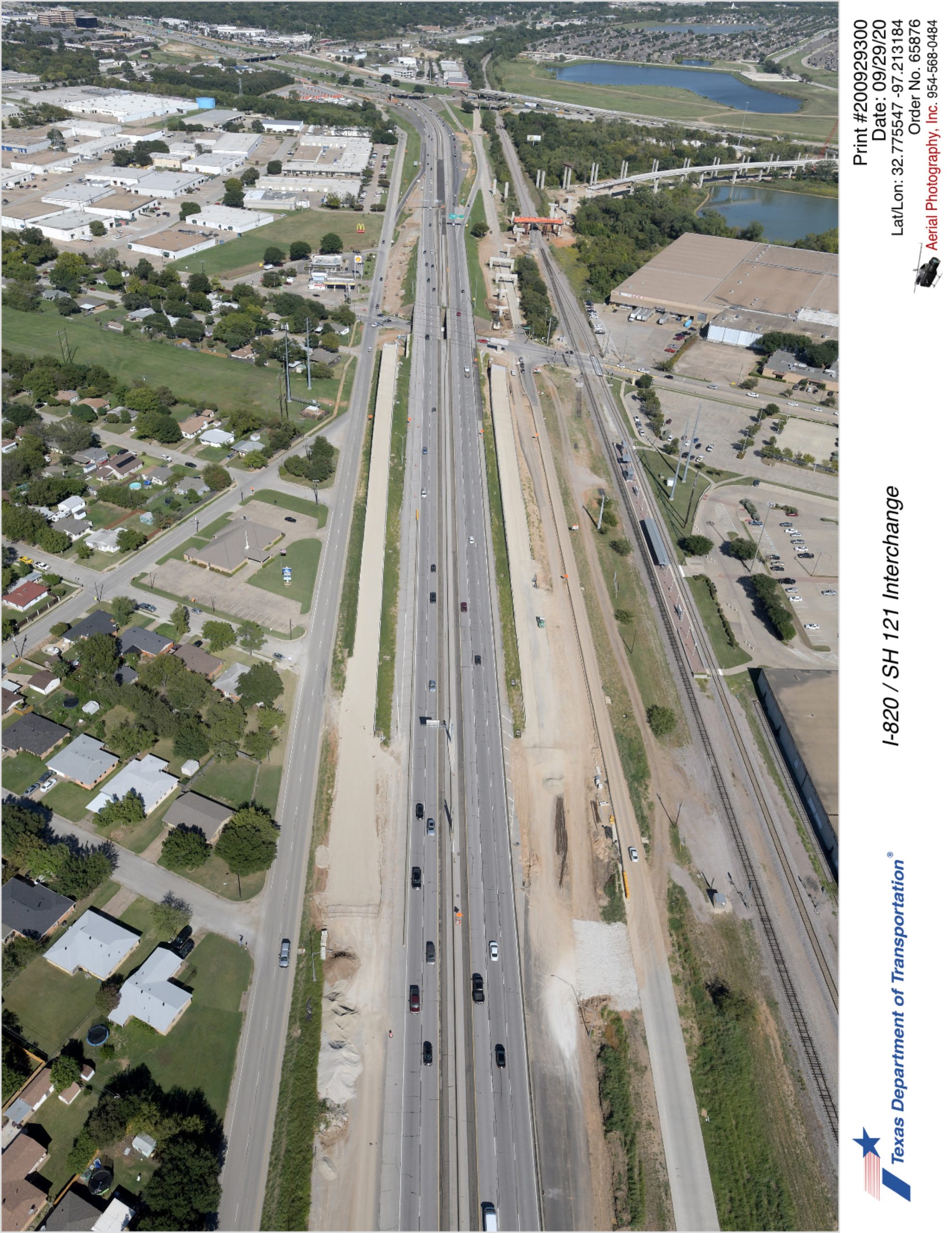 SH 121 looking northeast with Handley-Ederville Rd intersection in background. Construction of highway direct connectors shown in the background.