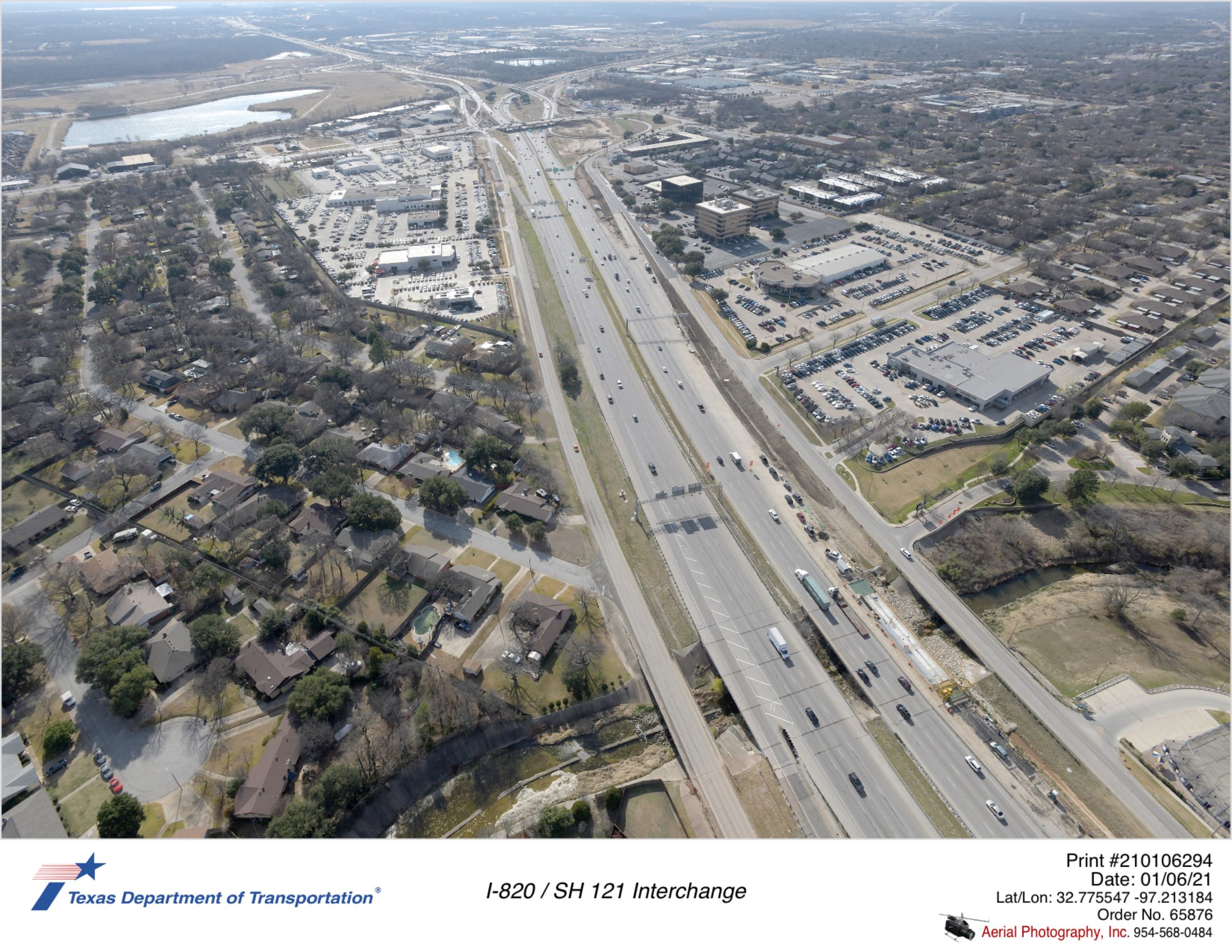 I-820 looking south over Calloway Branch. Construction of new I-820 southbound mainlane bridge over Calloway Branch is shown.