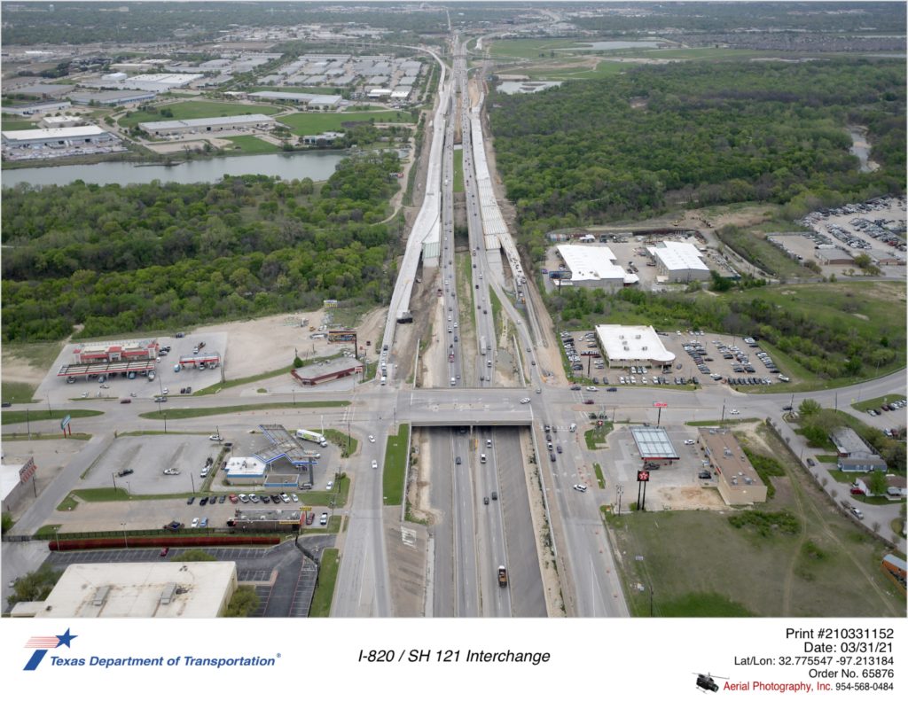 I-820 looking north over Randol Mill Rd interchange in foreground. Construction of new northbound and southbound I-820 lanes north of Randol Mill Rd shown.