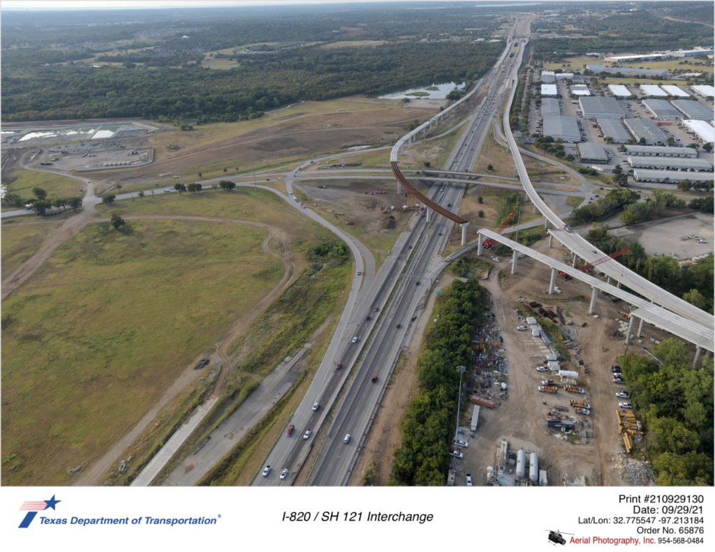 I-820 looking south at Trinity Blvd interchange. Construction of direct connectors over I-820 shown.