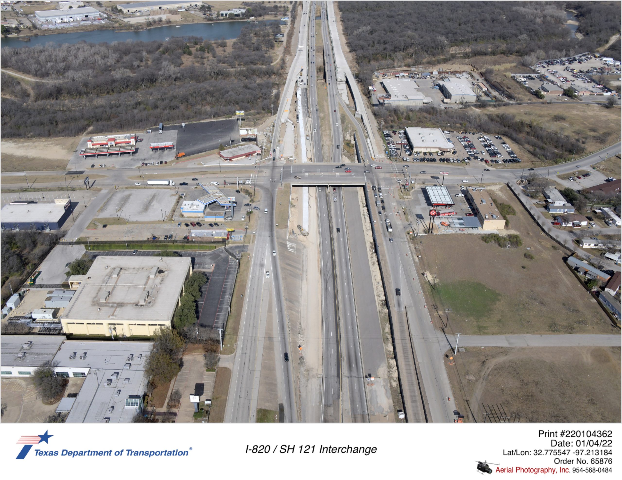 I-820 looking north at Randol Mill Rd interchange. Construction of new pavement and bridges north of Randol Mill Rd shown. Pavement construction shown for southbound traffic passing under Randol Mill Rd.