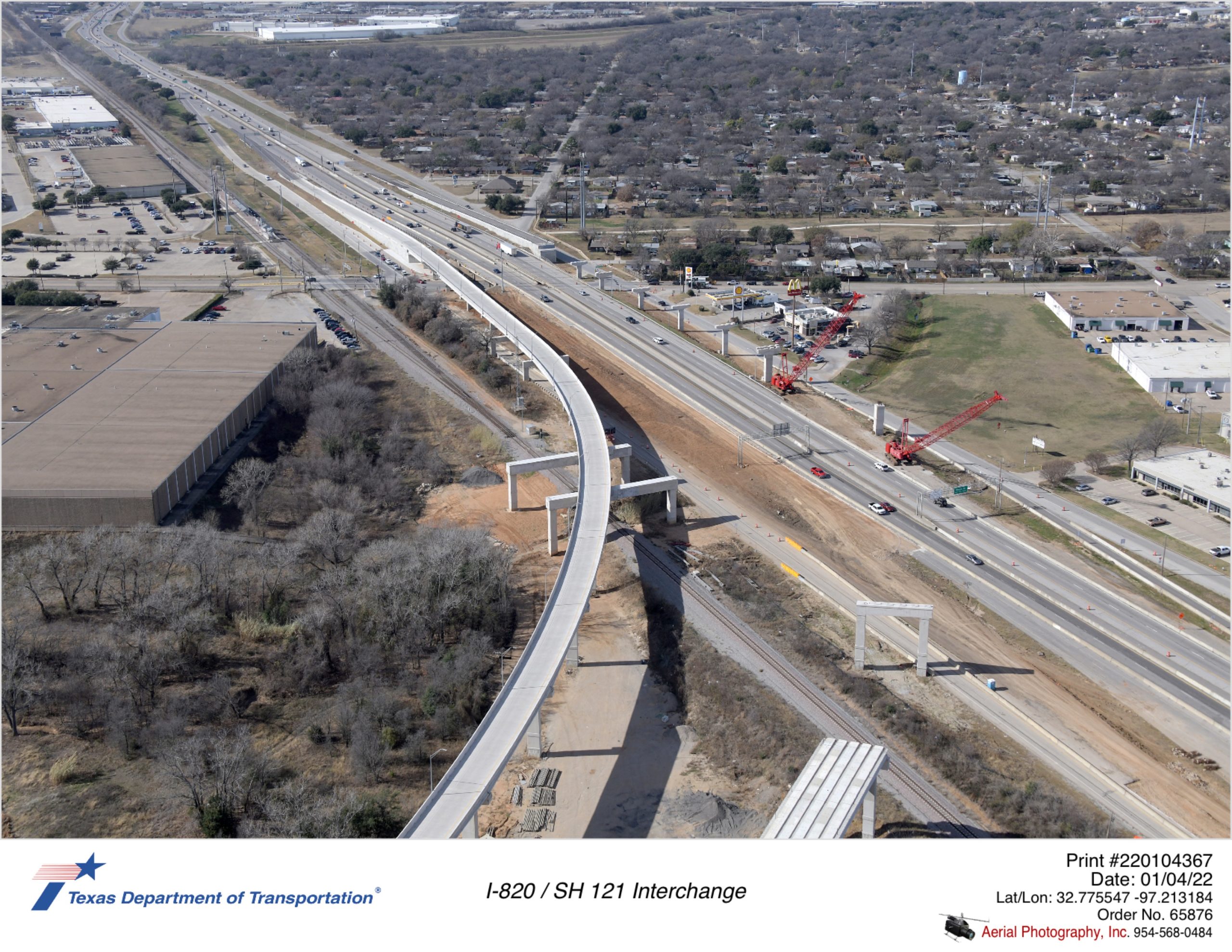 SH 121 looking west at direct connector construction. North-to-south direct connector construction shown along north side of SH 121.