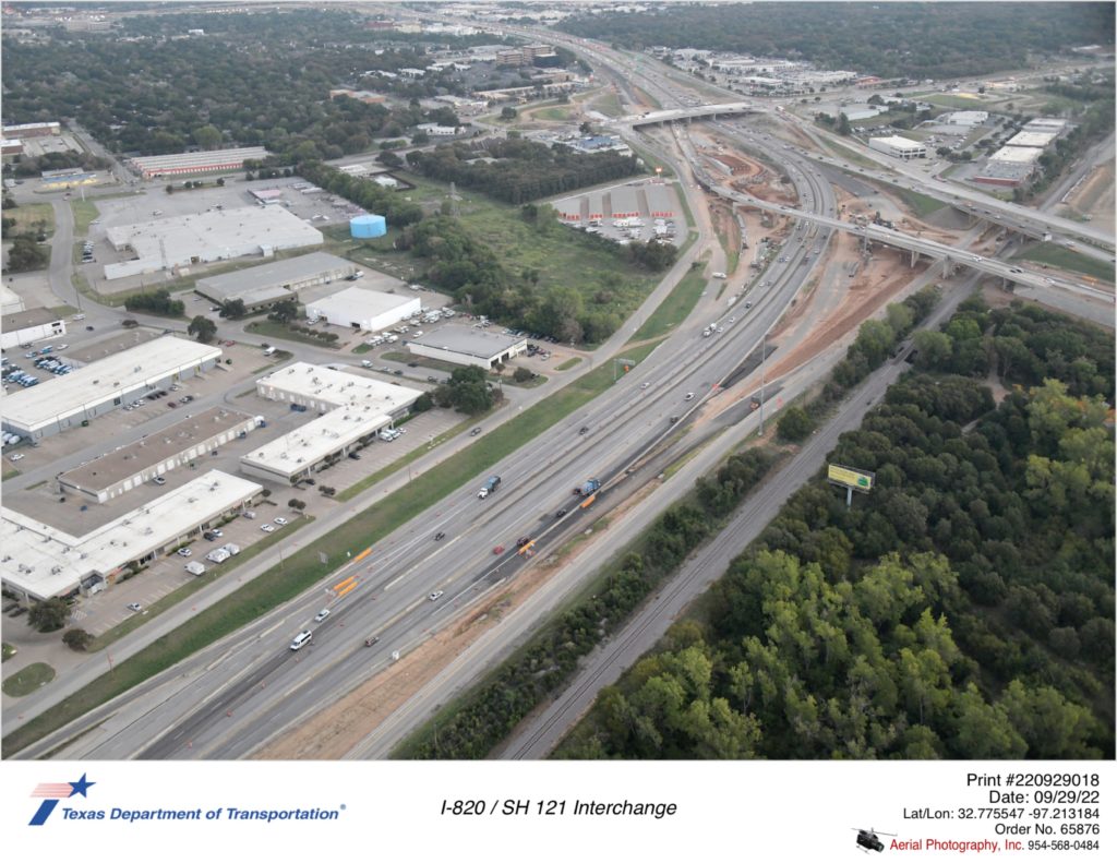 I-820/SH 121 interchange looking northeast. Construction activity closest to I-820/SH 121 merge.