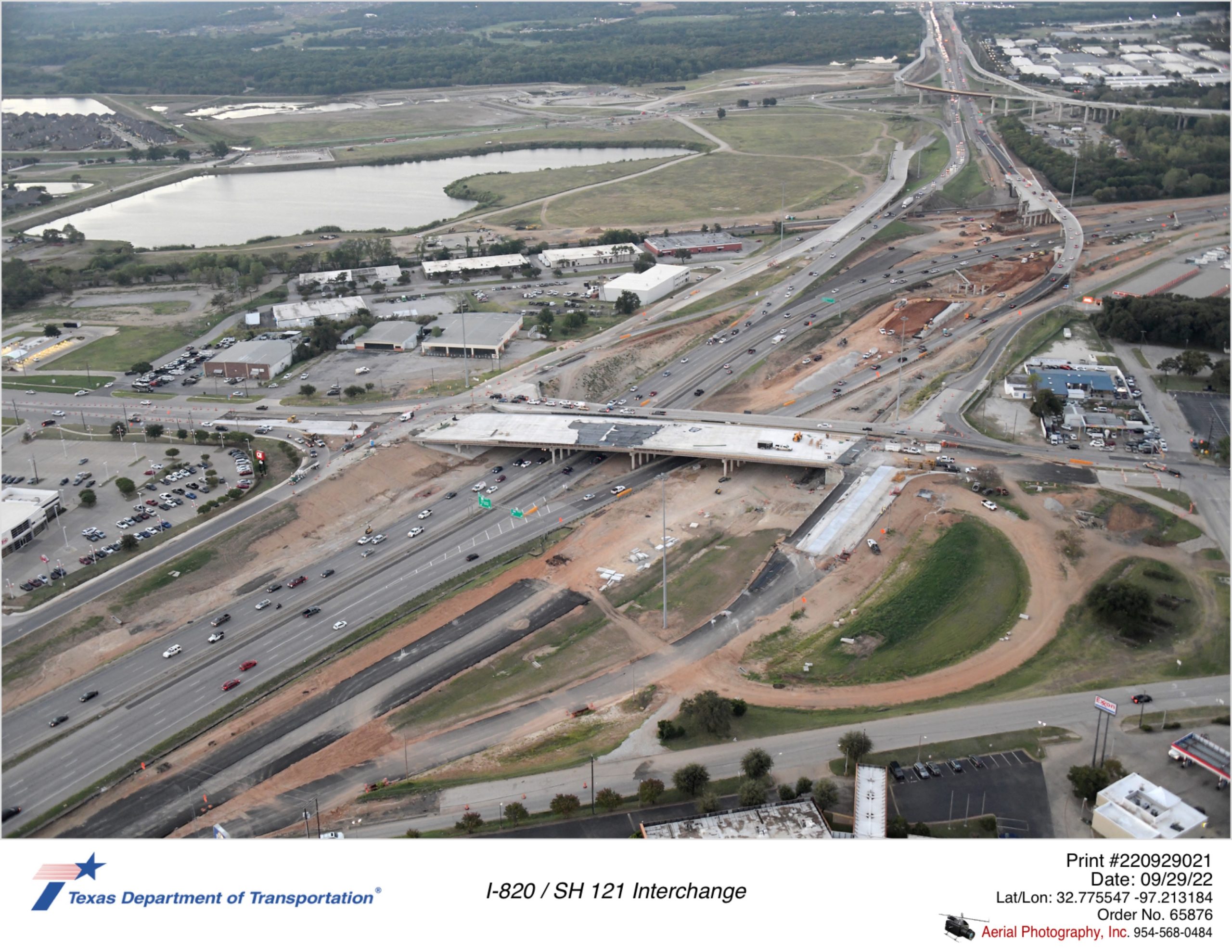 I-820/SH 10 interchange. Construction of main bridge continues and new southbound frontage road construction shown.