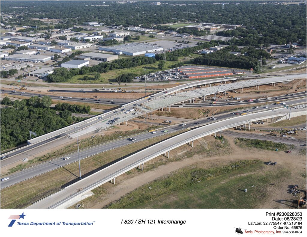 I-820 and SH 121 interchange looking northwest. Image shows construction of new I-820 southbound mainlane bridge over SH 121.