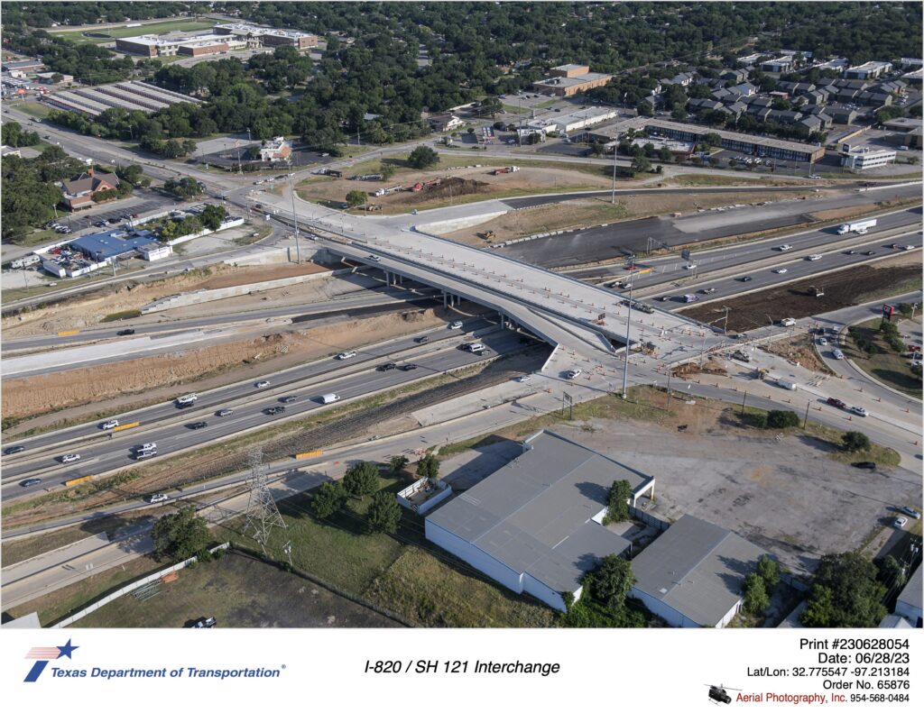 I-820 and SH 10 interchange looking northwest. Image shows construction of SH 10 bridge.
