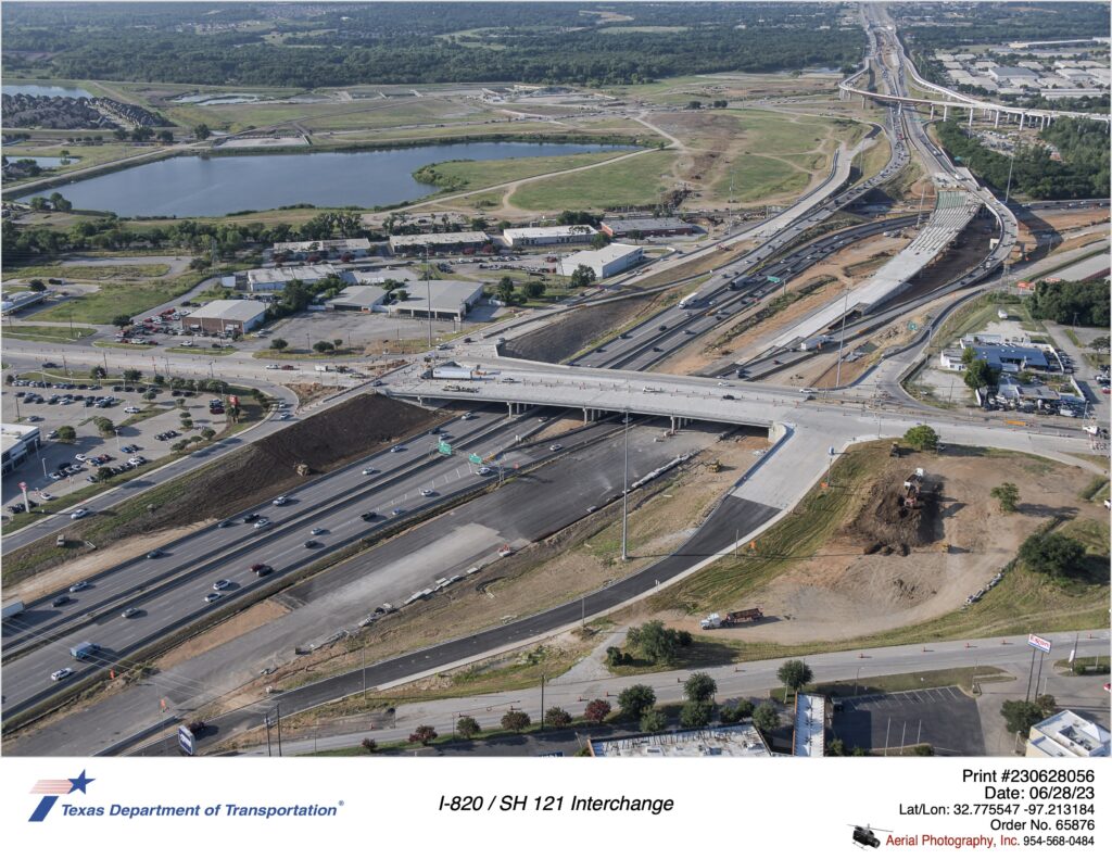 I-820 and SH 10 interchange looking southeast. Image shows new southbound frontage road to SH 10 and new I-820 southbound mainlane construction.